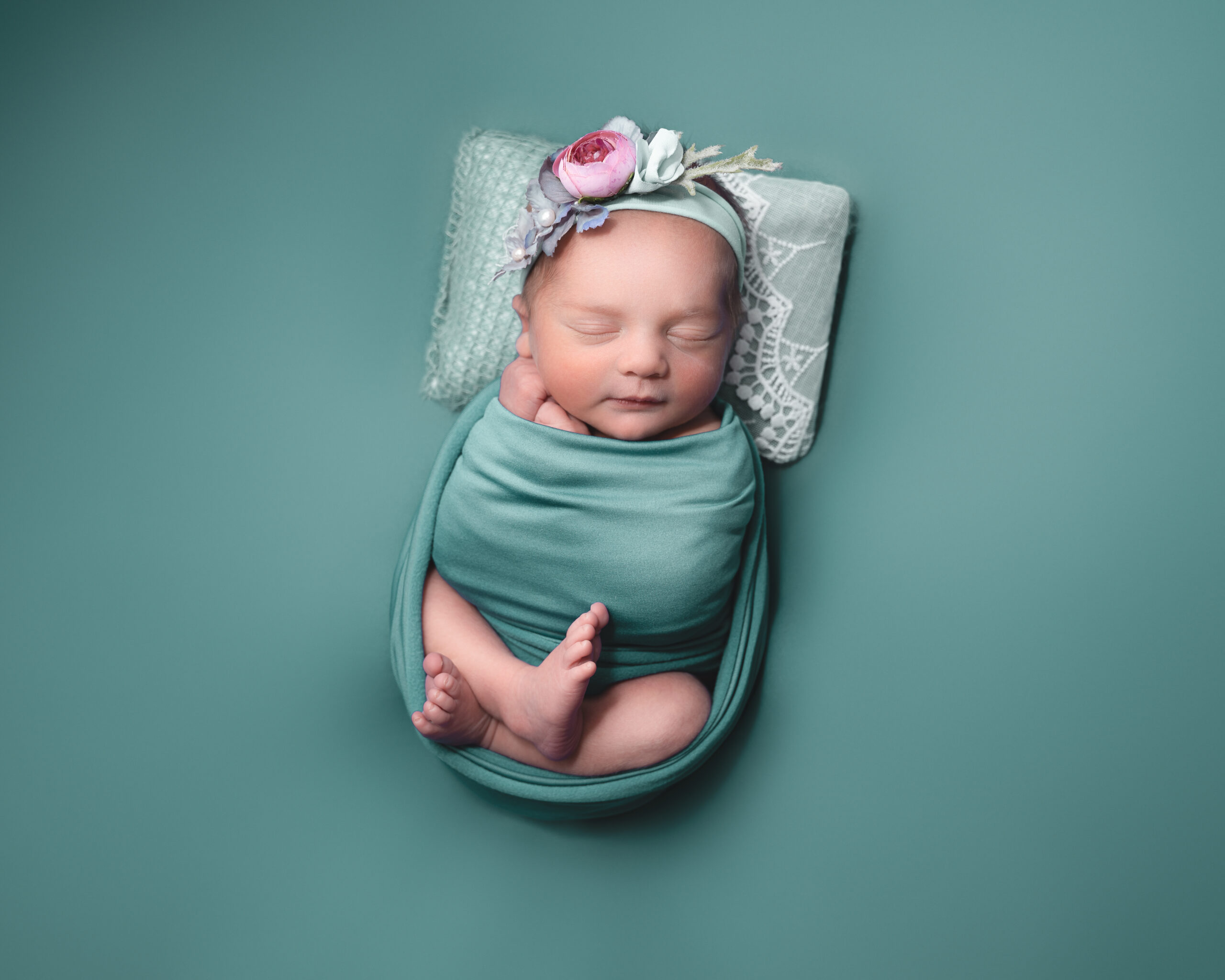 Baby girl in mint